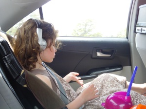 Singing along to her "tunes" to the great delight of the rest of us.